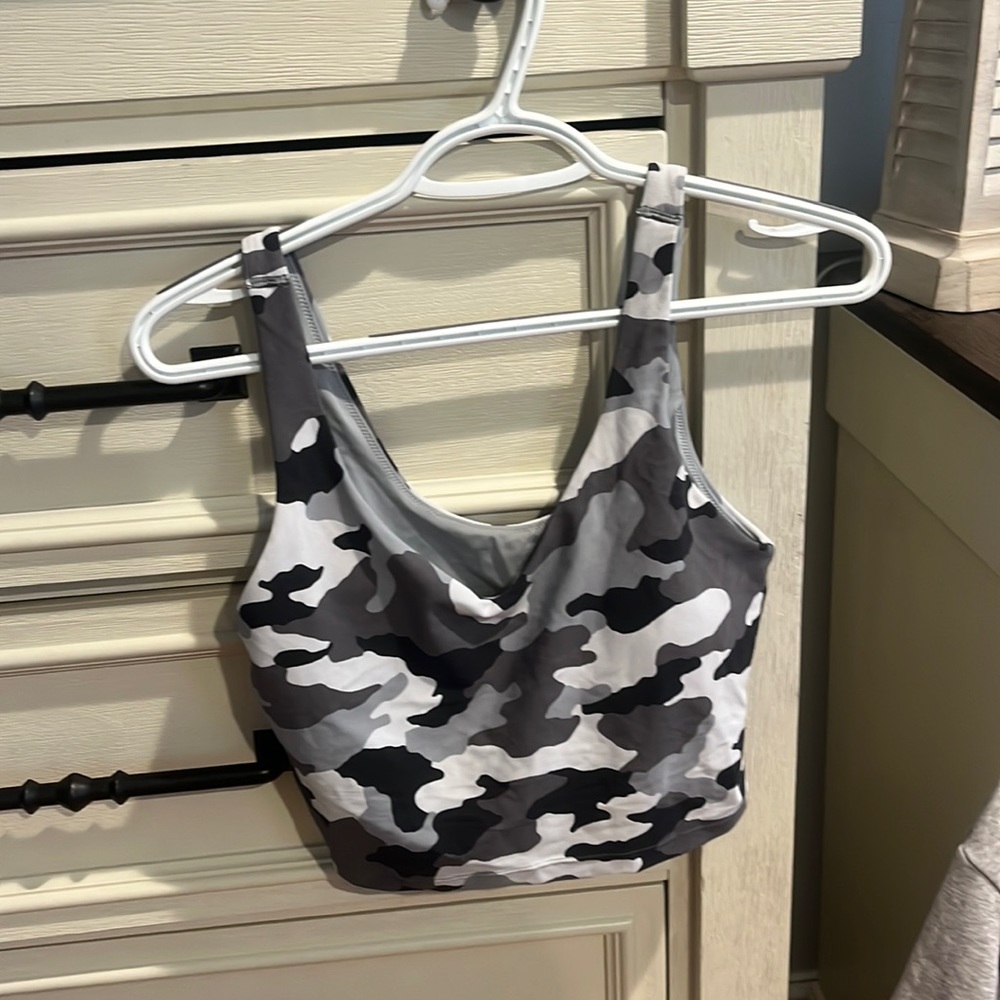 its an aerie offline top in camo, NEVER WORN